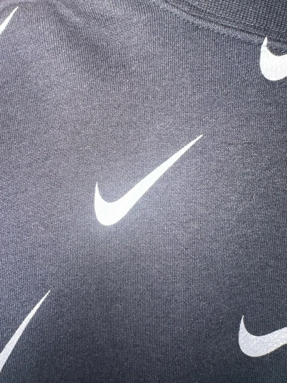 Nike Black Crewneck with Repeated White Swoosh Pattern NWOT L athleisure gym